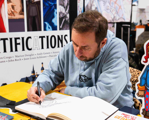 Andy Genen sur le stand de la BD luxembourgeoise